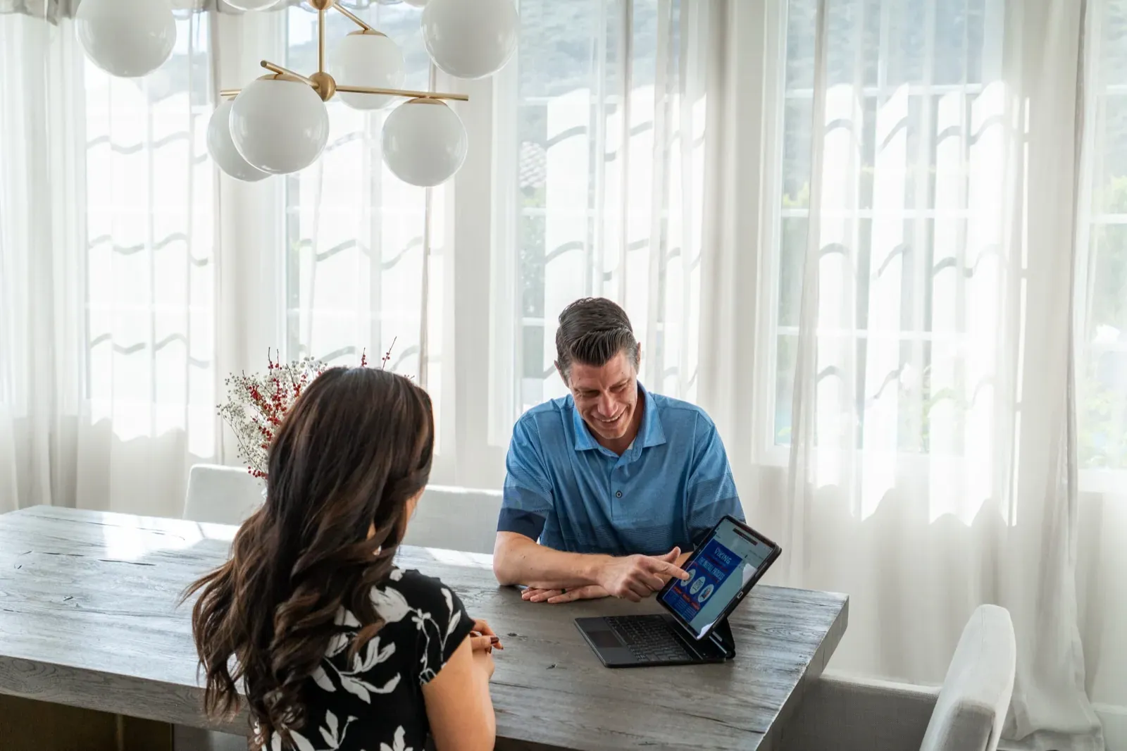 A Viking technician reviewing comfort options with a customer