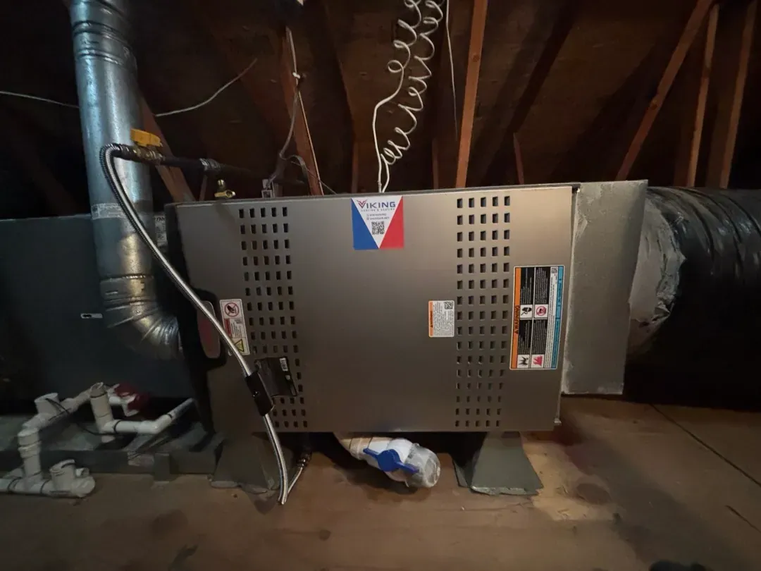 A Viking-installed furnace and insulated ductwork in an attic